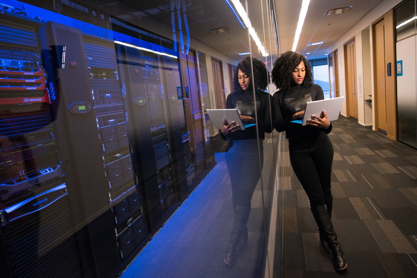 AXAON engineer reviewing infrastructure in a data center